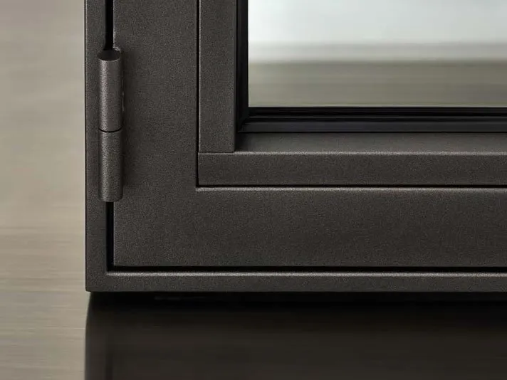 Precision fabricated steel window profile detailing with thermal break
