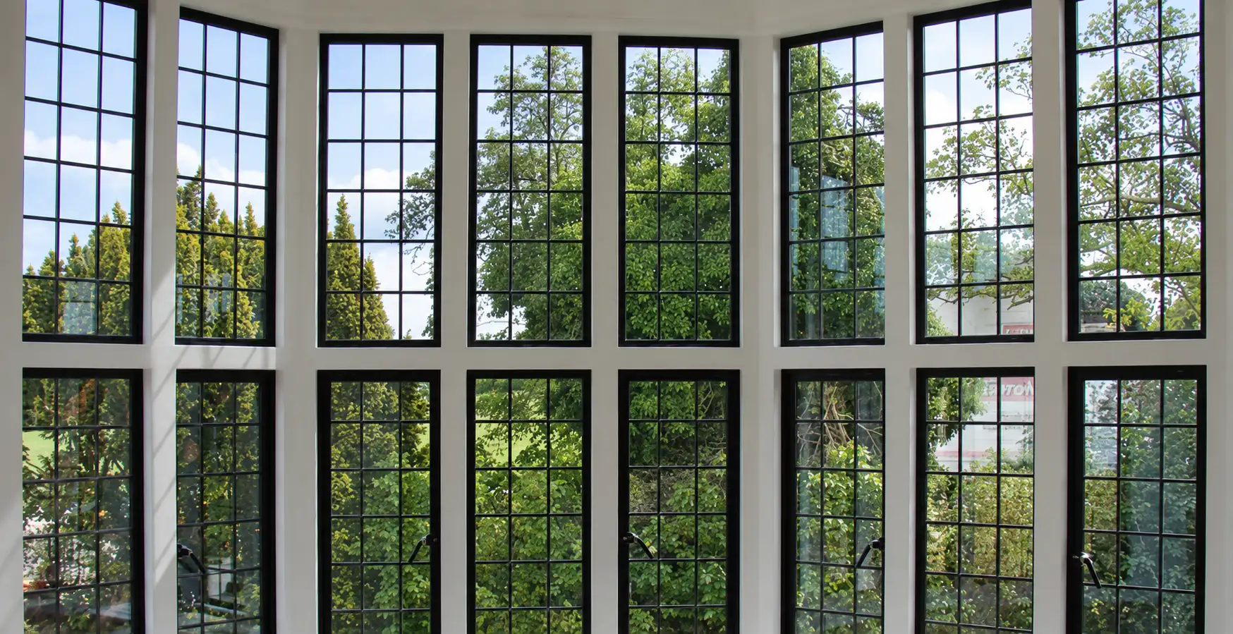 Custom architectural steel windows with muntin grills